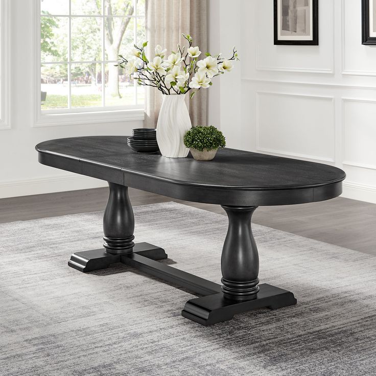 Bàn ăn oval chân lục bình sơn đen
