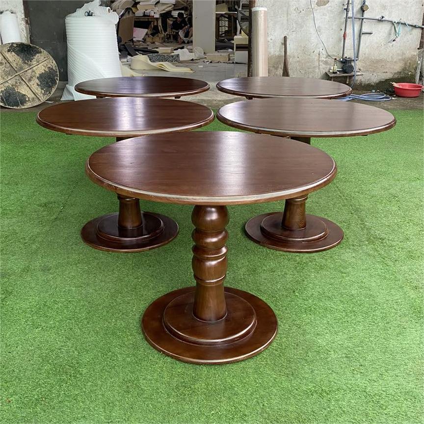 Bàn ăn tròn chân tiện lục bình